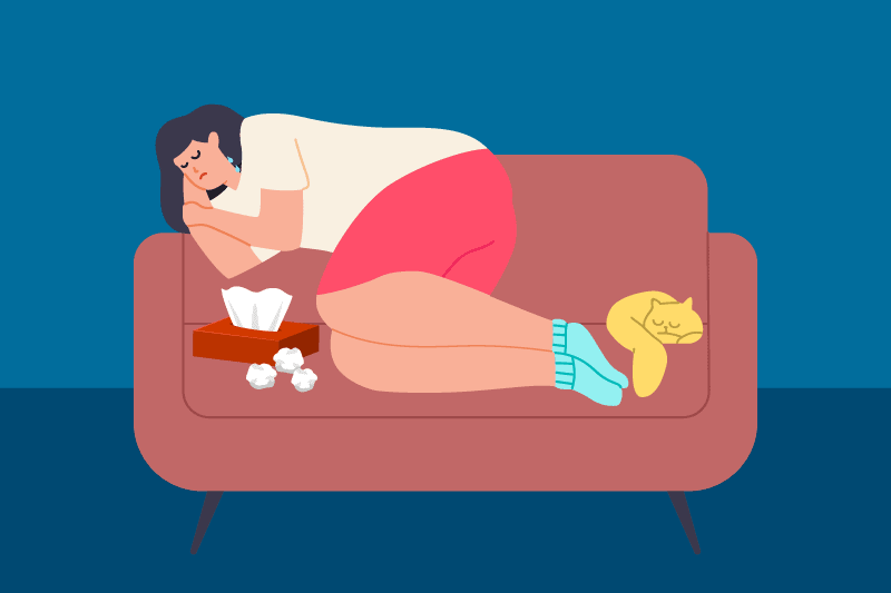 An illustration of a woman laying on a couch who looks tired and lethargic.